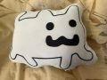 The plush, as shown on the page for the Kickstarter campaign that formerly distributed them.